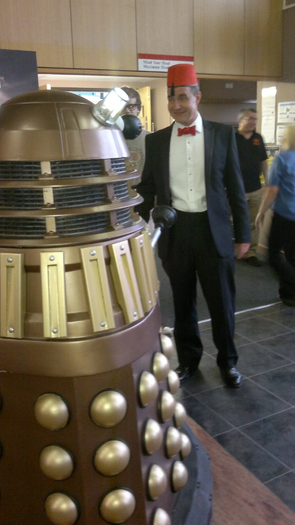 Stars of the social evening, 'Quizmaster' Tony - Fez's are cool - Holder with the Dalek